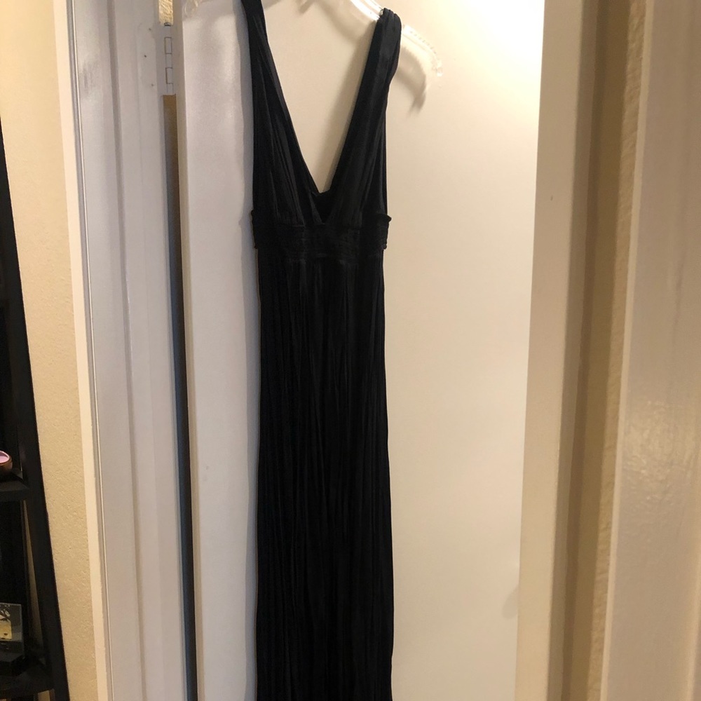 Long flowy light weight maxi dress with subtle side and back cutouts